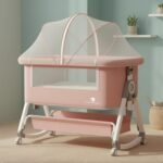 StarAndDaisy Cradle for New Born Baby Crib for Infant & Toddler with Height Adjustment, Locking Wheels,Mosquito net, Storage Basket -Pink