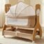R for Rabbit Lullabies Woodsy 2 in 1 Manual Swing Wooden Cradle Newborn Baby Convertible Cot Bassinet with Mosquito Net, Lockable Wheels & Storage Space for Kids 0-12 Months, Upto 12 Kg (Beige)