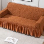 HOKIPO 3 Seater Jacquard Sofa Cover with Ruffled Skirt | Stretchable Elastic Fit Couch Cover | Premium 240 GSM Fabric | Washable Slipcover for Living Room Sofa, Caramel Brown (AR-4648-J4)
