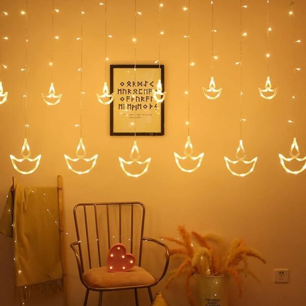 The Purple Tree Decorative Diya Diwali Light Curtain, String Lights with 12 Hanging Diyas, 8 Flashing Modes - 2.5 Meter (1 Curtain) 138 Led, Diwali Decorative Light
